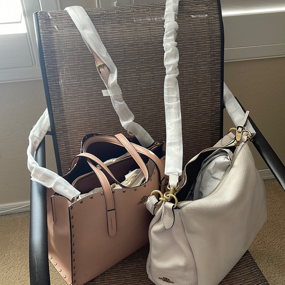 2 Coach handbags like new kept very well very clean $85 each